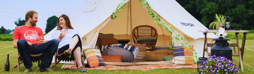 couple next to a tent 