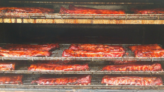 Racks of ribs in an oven 