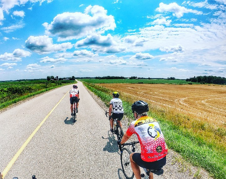 cyclists on a county road