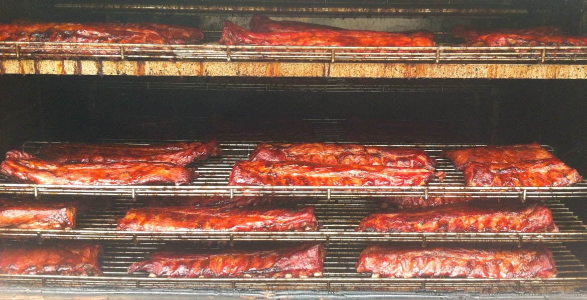 Racks of ribs in an oven 