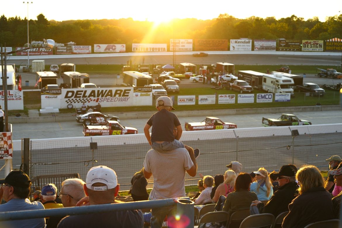 Crowd watching race cars