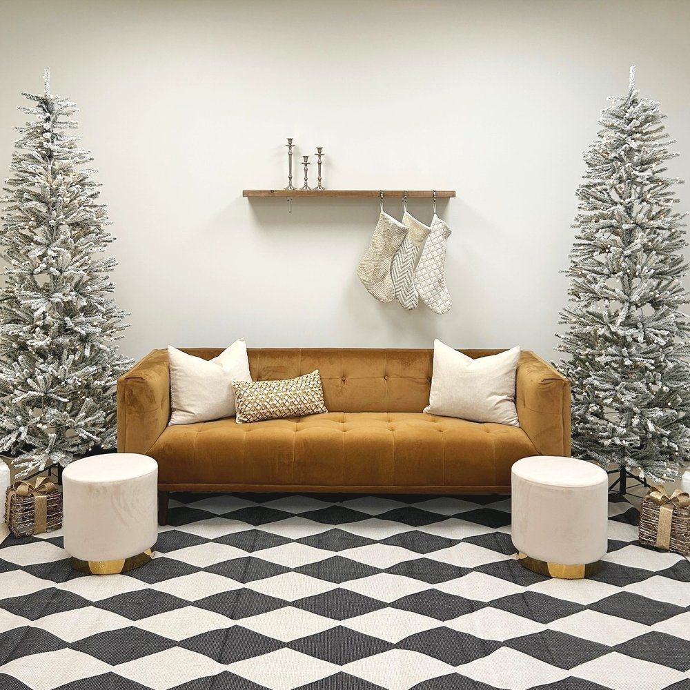 Couch with two Christmas trees