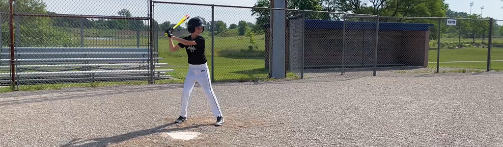 Little boy playing baseball 